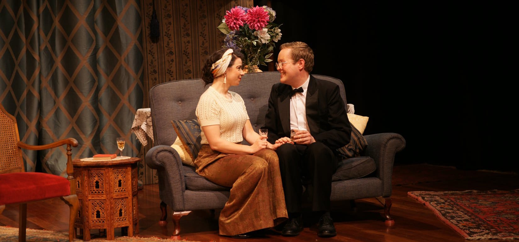 Henrietta and Edward Angkatell look happily into each other’s eyes in a lavish English country house.